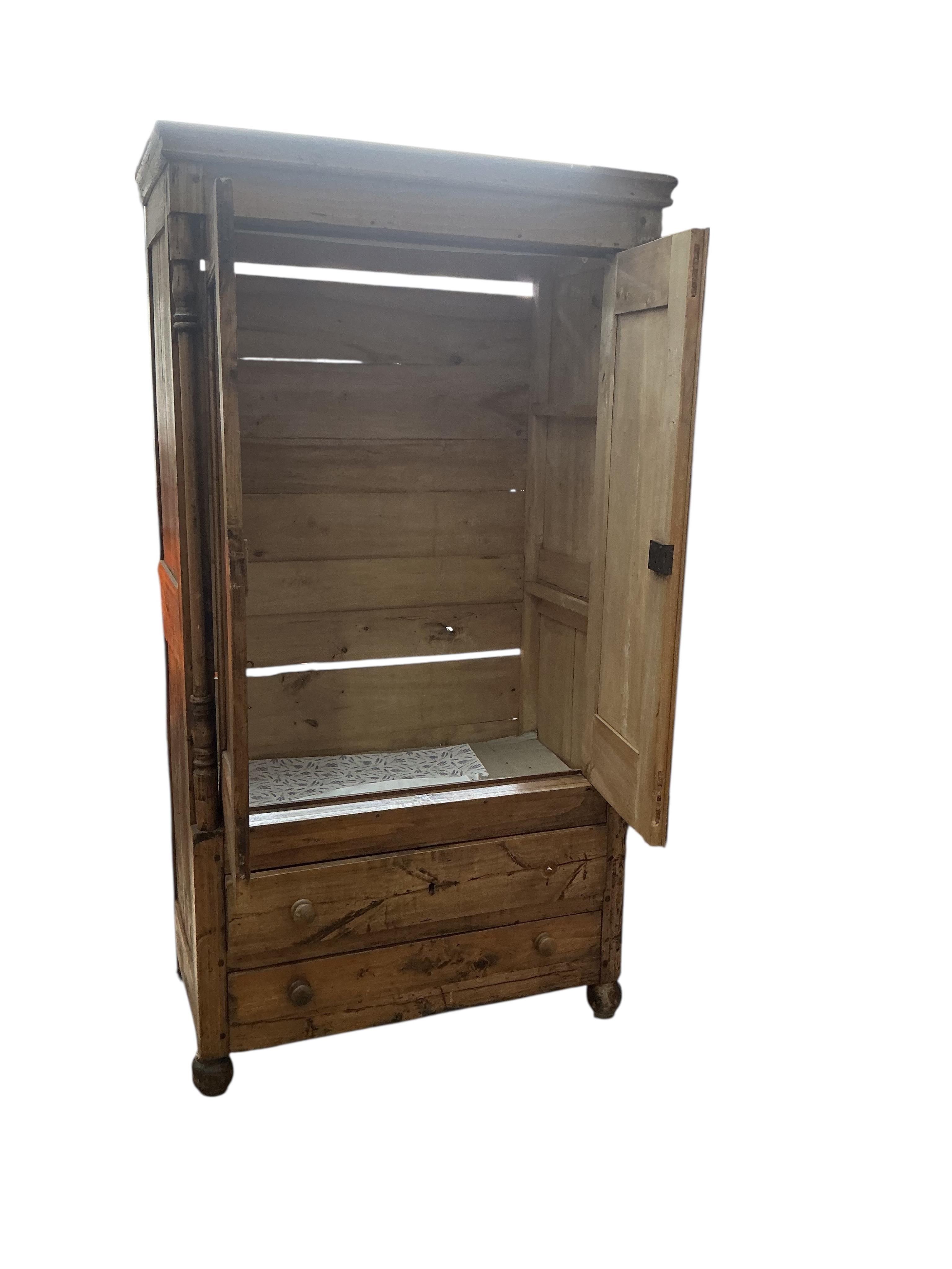 A 19th century French fruitwood armoire, width 104cm, depth 57cm, height 96cm